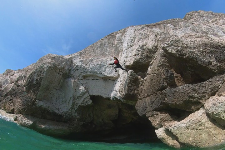 water next to the rock