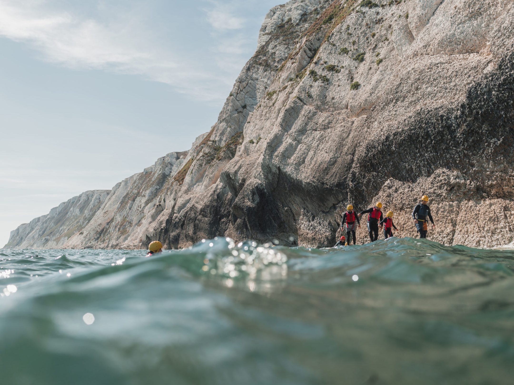 a man riding a wave on top of a mountain