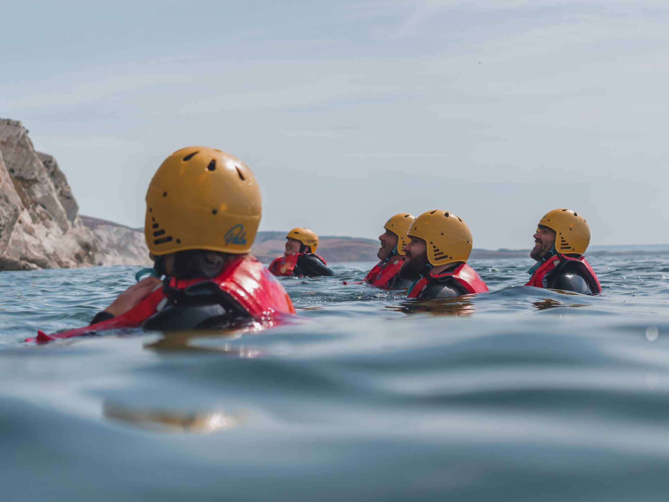 a group of stuffed animals that are in the water