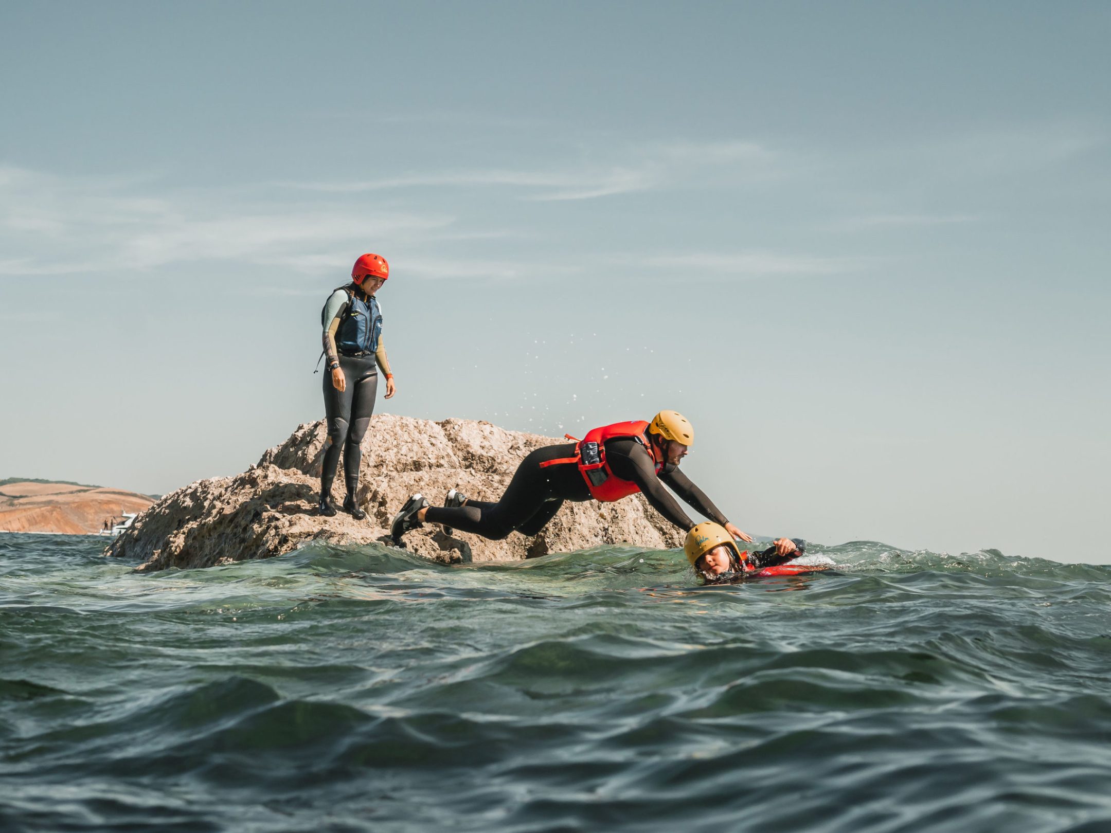 a person riding a surf board on a body of water